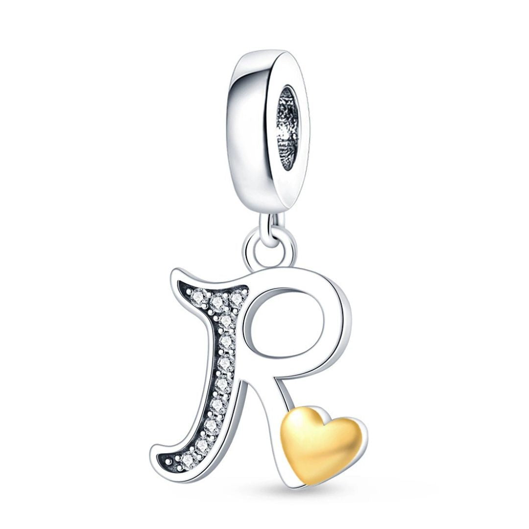 Charm inicial cursiva